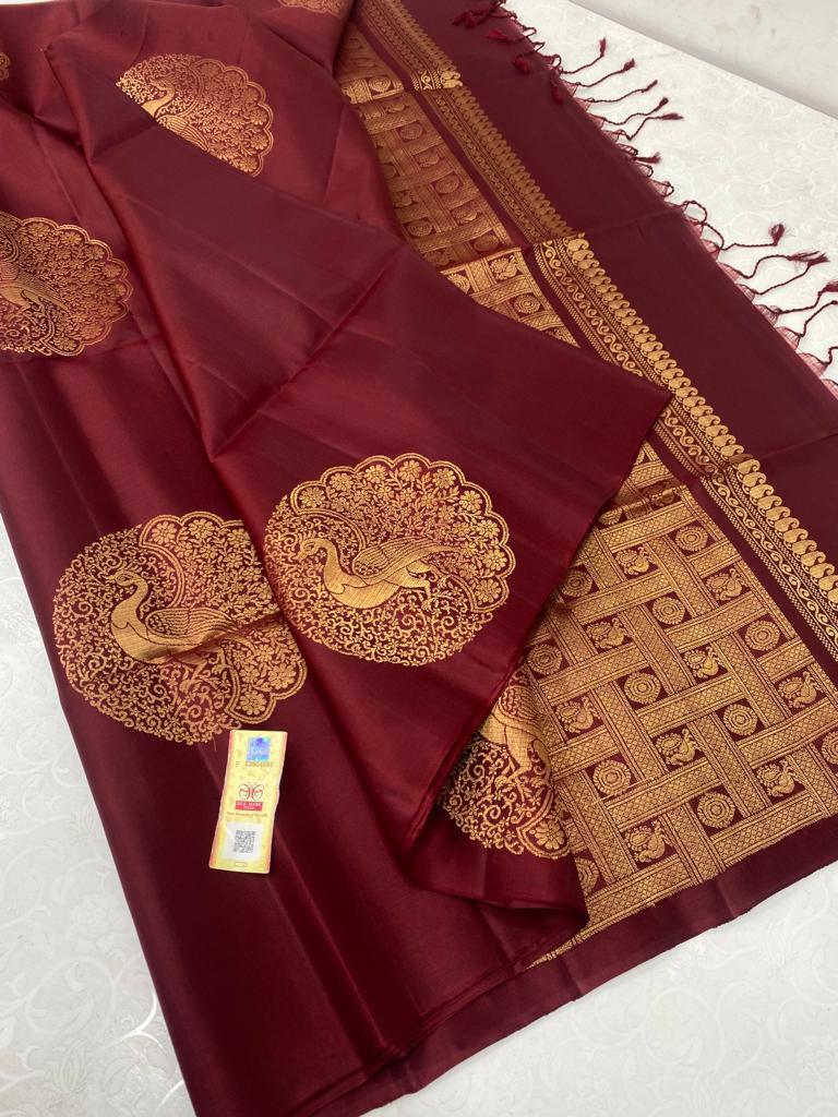 Borderless Maroon Soft Silk Saree with Unique Peacock Butta