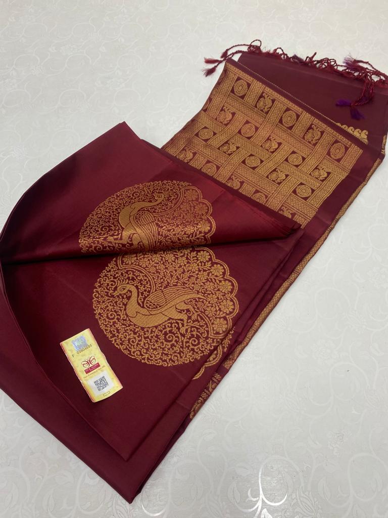 Borderless Maroon Soft Silk Saree with Unique Peacock Butta