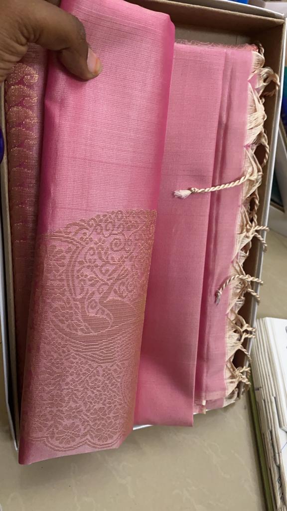 Borderless Baby Pink Soft Silk Saree with Unique Peacock Butta