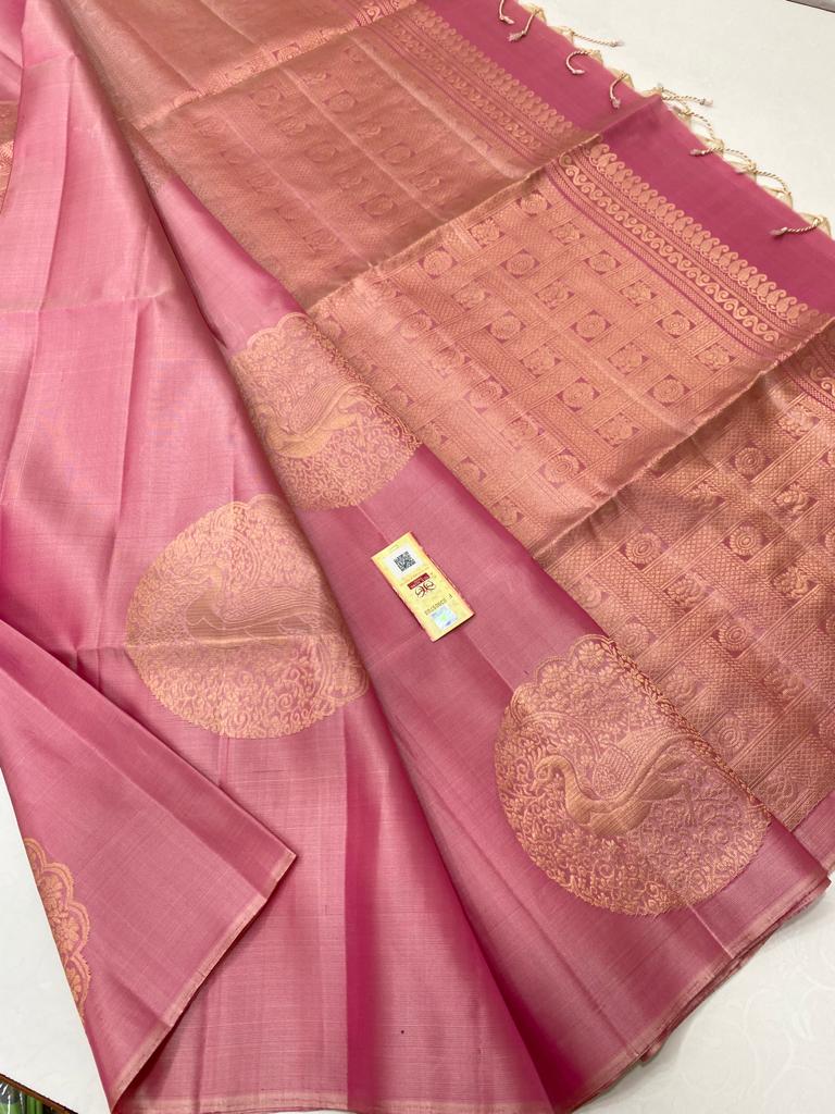 Borderless Baby Pink Soft Silk Saree with Unique Peacock Butta