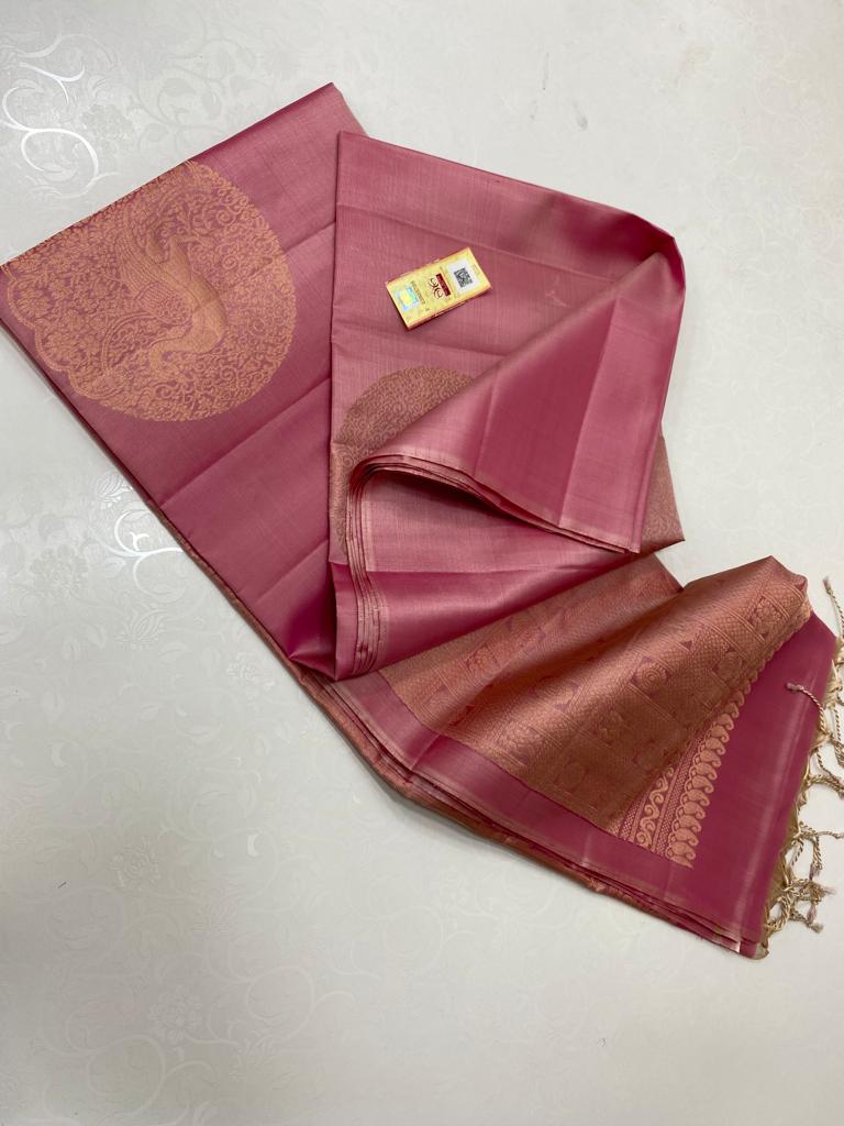 Borderless Baby Pink Soft Silk Saree with Unique Peacock Butta