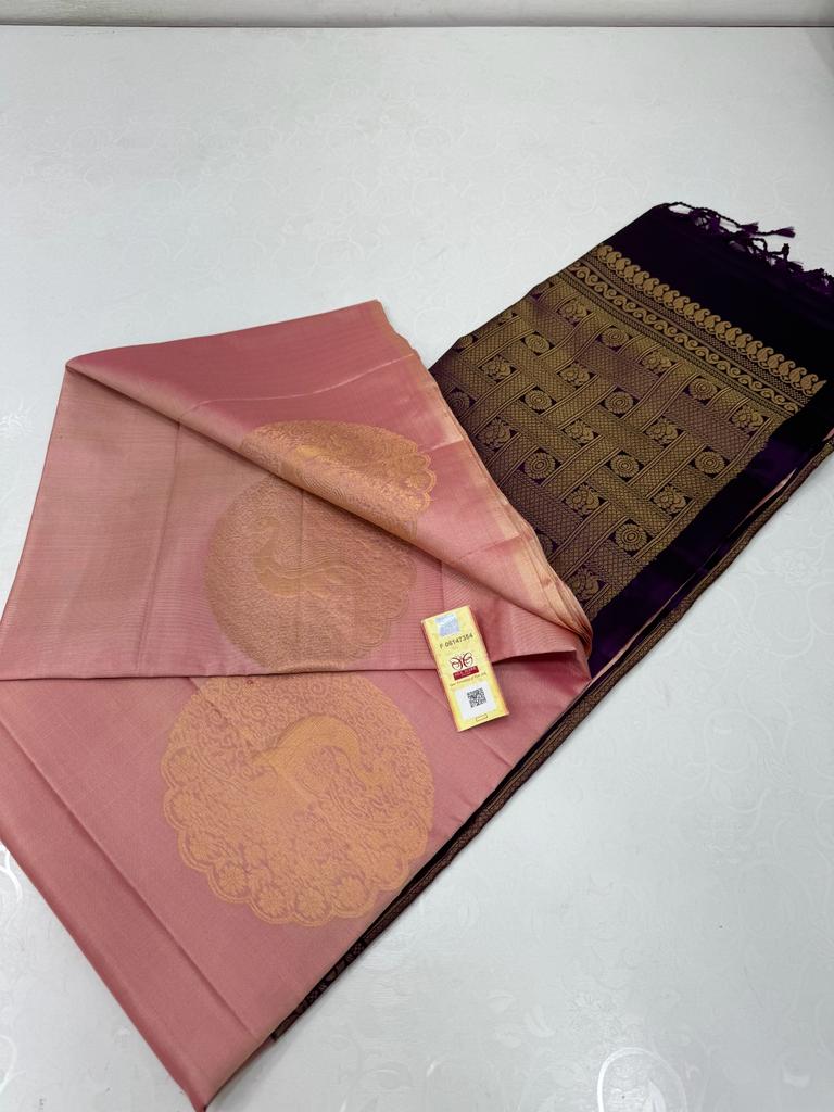 Borderless Pastel Pink Soft Silk Saree with Unique Peacock Butta