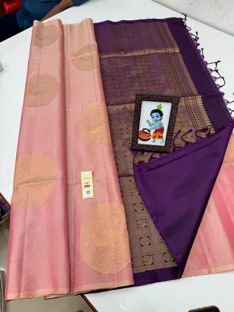 Borderless Pastel Pink Soft Silk Saree with Unique Peacock Butta