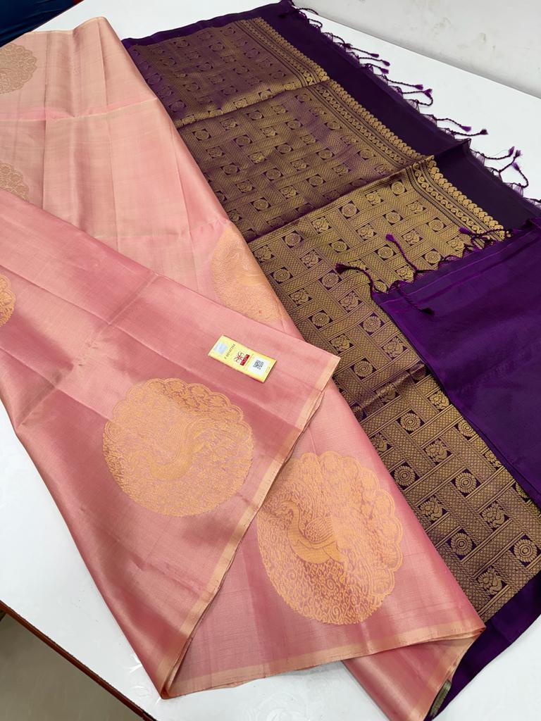 Borderless Pastel Pink Soft Silk Saree with Unique Peacock Butta