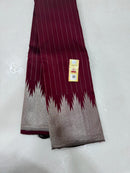 Maroon Kanchipuram Silk Saree with Silver Zari Temple Border