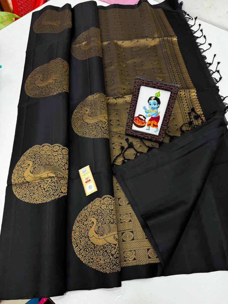 Borderless Black Soft Silk Saree with Unique Peacock Butta