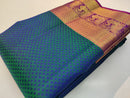 Peacock Blue Embossed Kanchipuram Pure Silk Saree