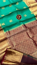 Green Organza Saree with Kanchi Border