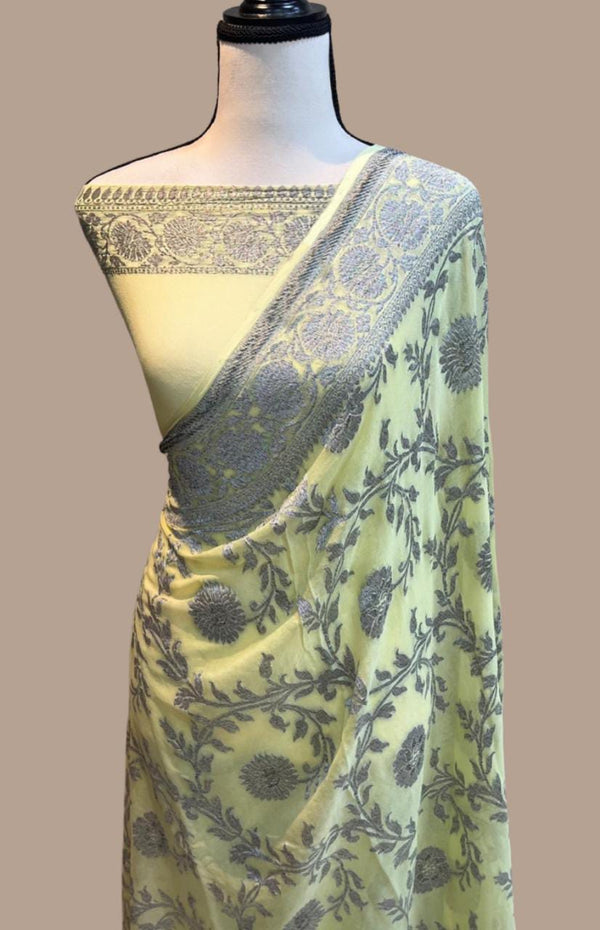 Pastel Yellow Khaddi Georgette Silk Saree with Unquie Black Neem Zari Jangla Design
