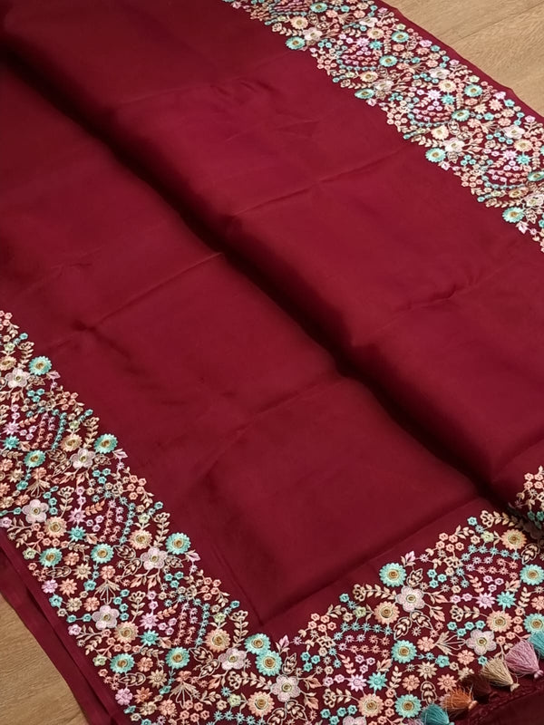 Maroon Organza Saree With Multi Floral Embroidery Border & Special Tassels
