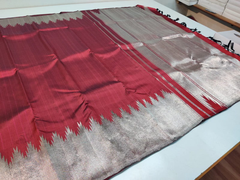 Reddish Maroon Kanchipuram Silk Saree with Silver Zari Temple Border