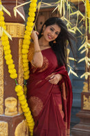 Borderless Maroon Soft Silk Saree with Unique Peacock Butta