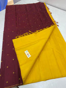 Plain Yellow Kanchipuram Silk Saree with Contrast Butta Pallu