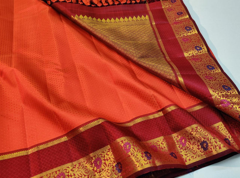 Orange Embossed Bridal Kanchipuram Silk Saree with Contrast Blouse